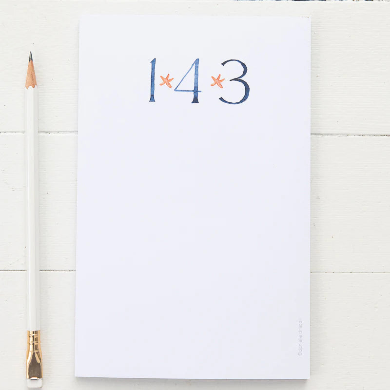 Tear away notepad.  At top blue 143 with red starfish  in between the numbers
