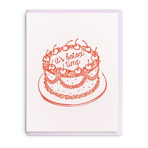 White birthday card with a orange cake in the middle that says "Its Botox Time".