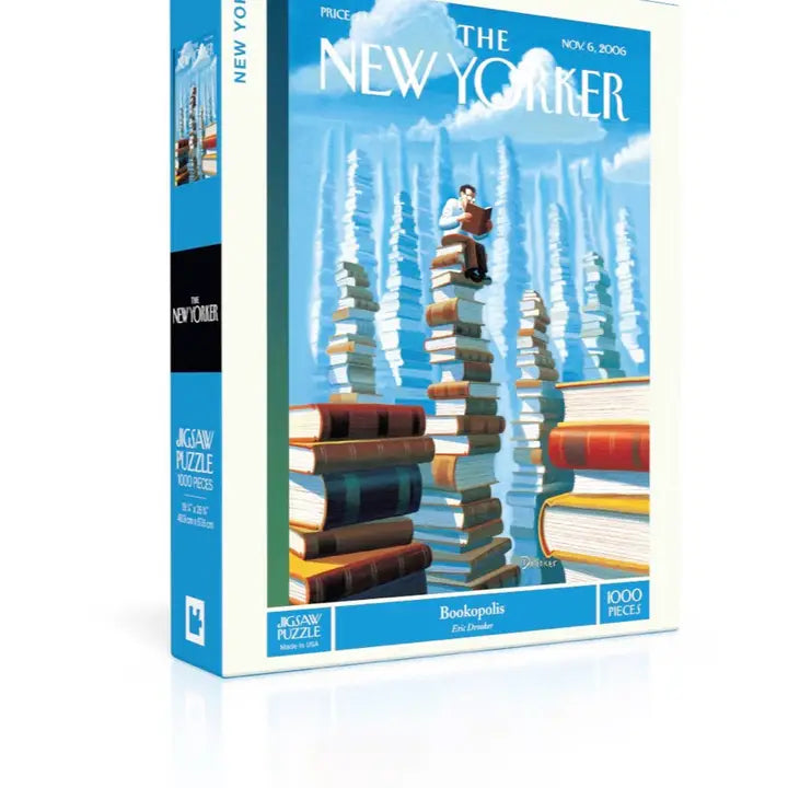 Puzzle box featuring 'The New Yorker' magazine cover with a stack of books and a person on top.