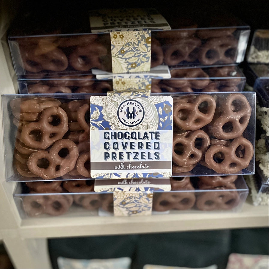 Packaged milk chocolate-covered pretzels with Mrs. Mekler's Mercantile label.
