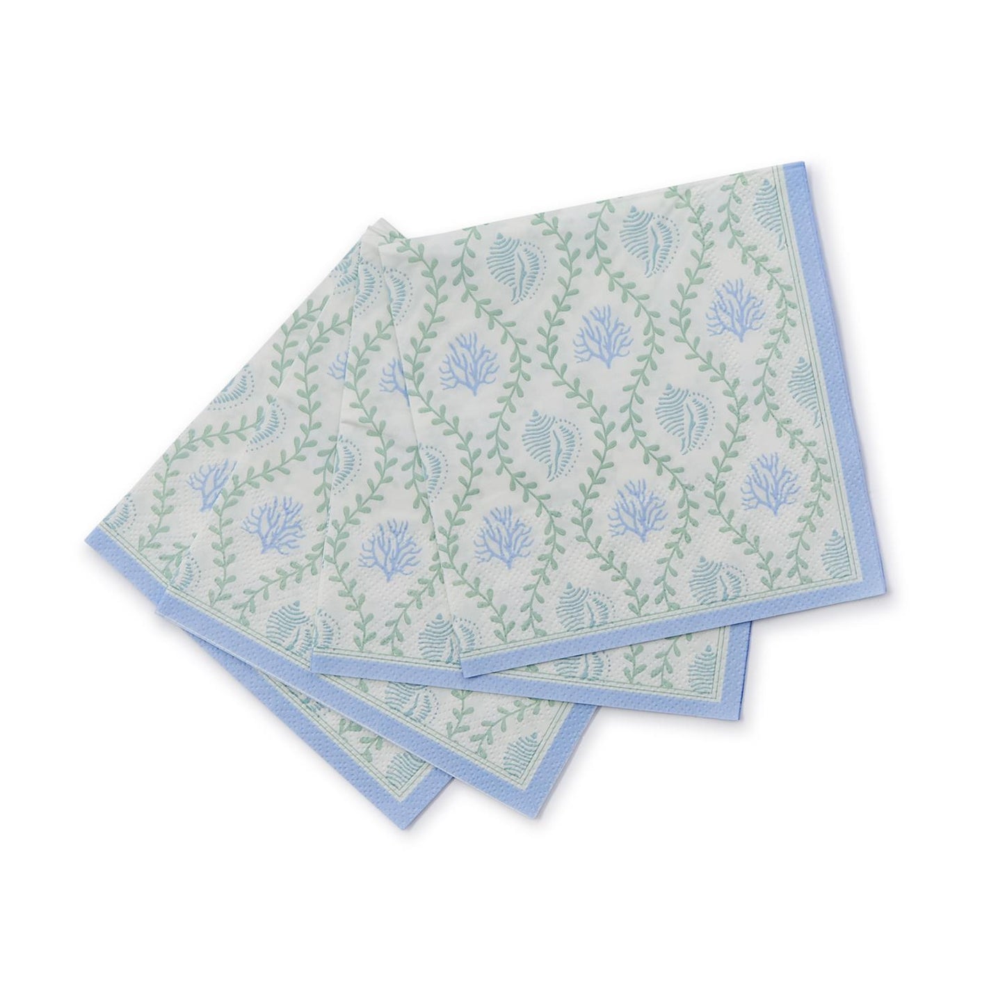 White cocktail napkin with blue decorations and beach symbols with green touches.