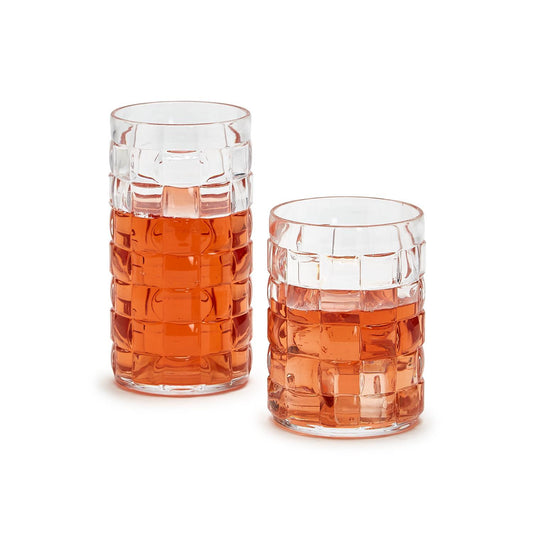 Glass cups with 3D cubes on them and an orange bottom