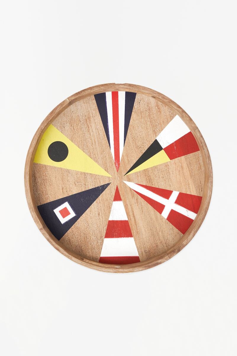 Round wooden serving tray with a decorative design of colorful nautical flags