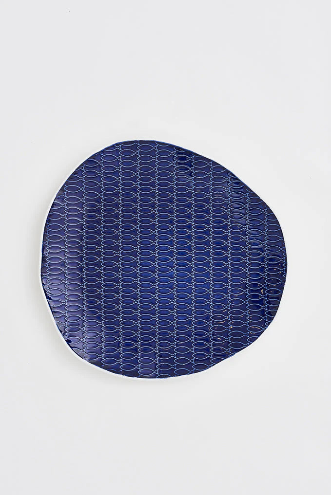 Rounded shaped ceramic blue platter with fish pattern