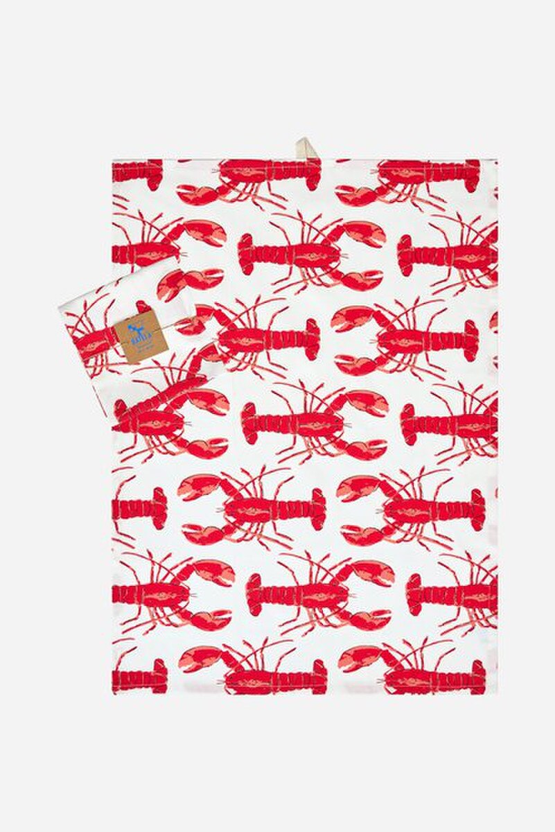 Tea towel with repeating red lobster pattern on a white background