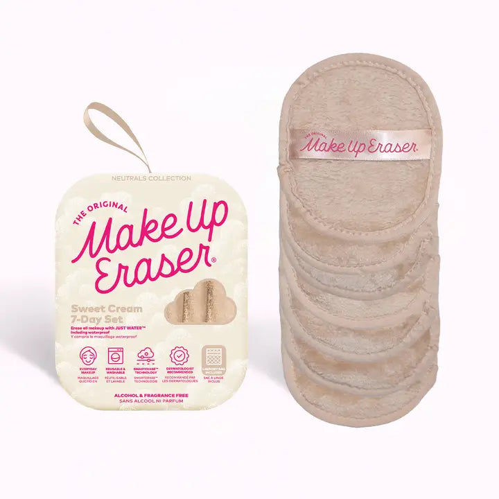 Set of seven cream colored "Makeup Eraser" soft face washing cloths with packaging on a white background