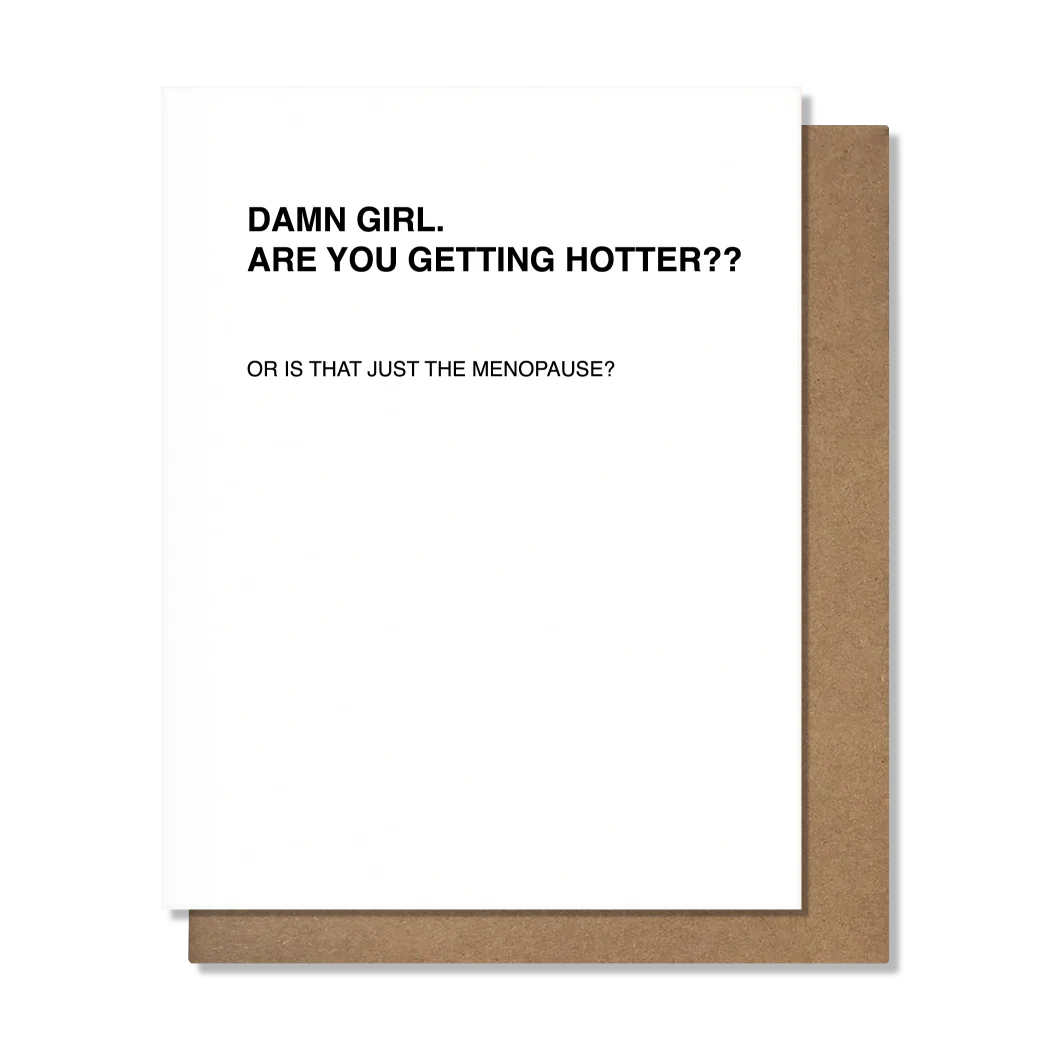 White card that has black letters on the top