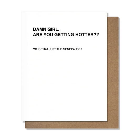 White card that has black letters on the top