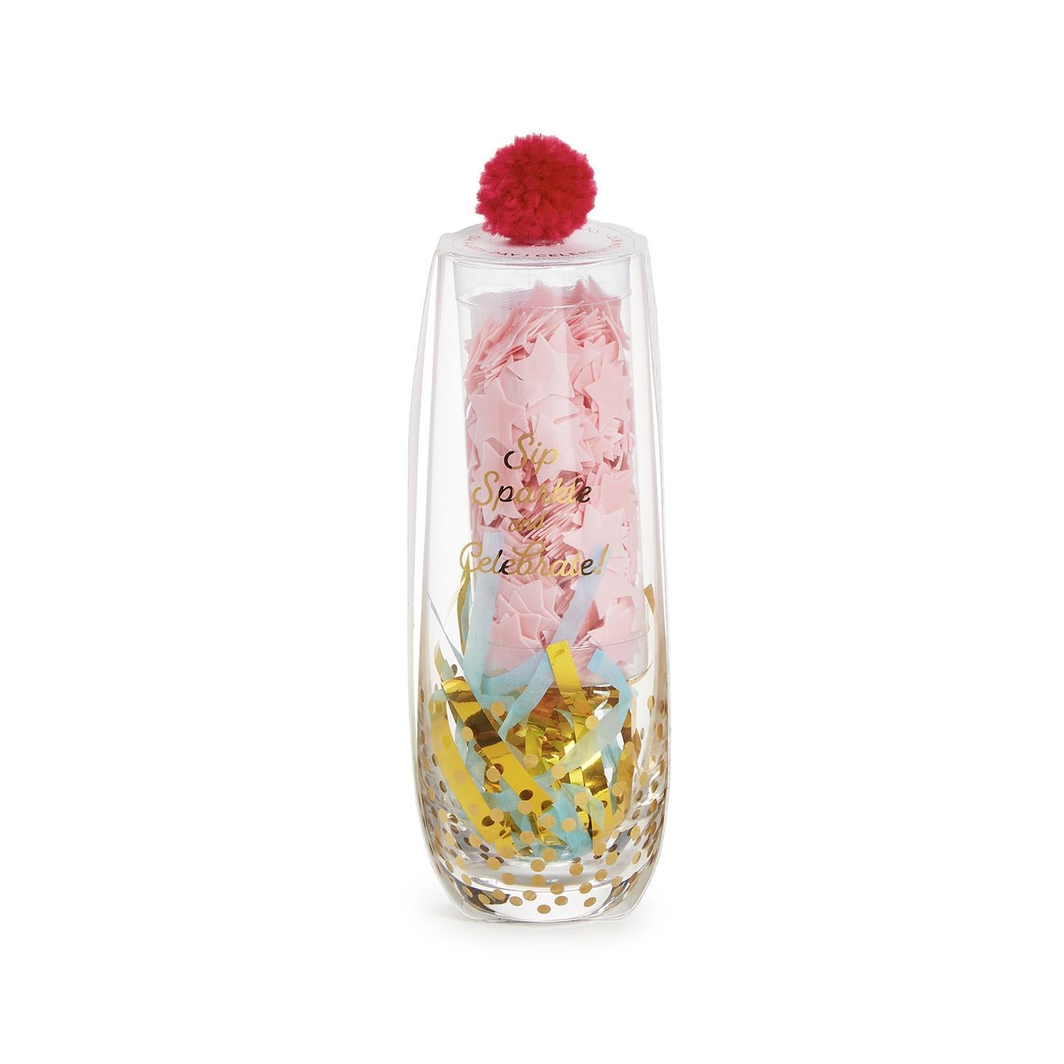 Fun champagne gift to celebrate a birthday with confetti and a red pom-pom on the top