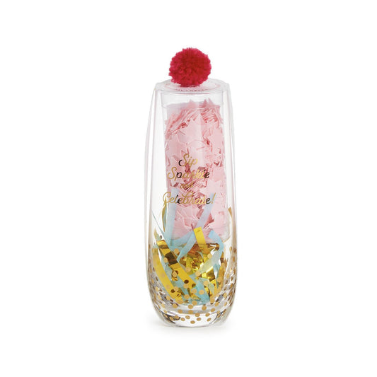 Fun champagne gift to celebrate a birthday with confetti and a red pom-pom on the top