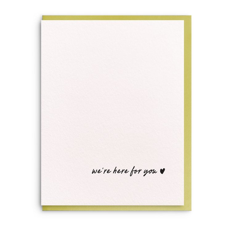 White sympathy card with black cursive letters and a small black heart in the bottom right corner.