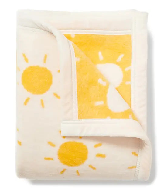 Folded White/Yellow Blanket with Shining Sun