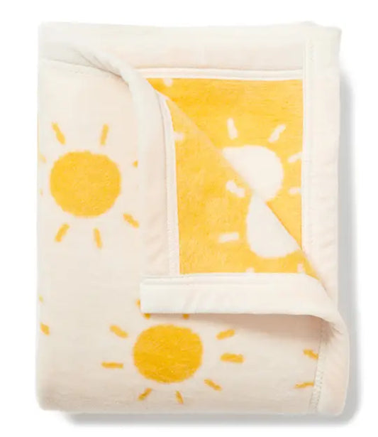 Folded White/Yellow Blanket with Shining Sun