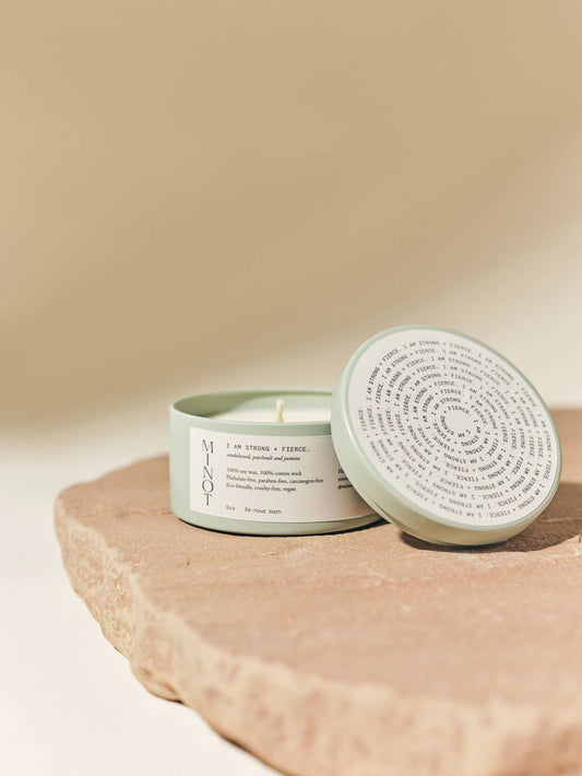 Minot candle with green outside and lid