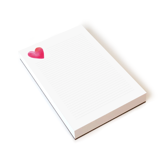 Lined notepad with red heart in top left corner