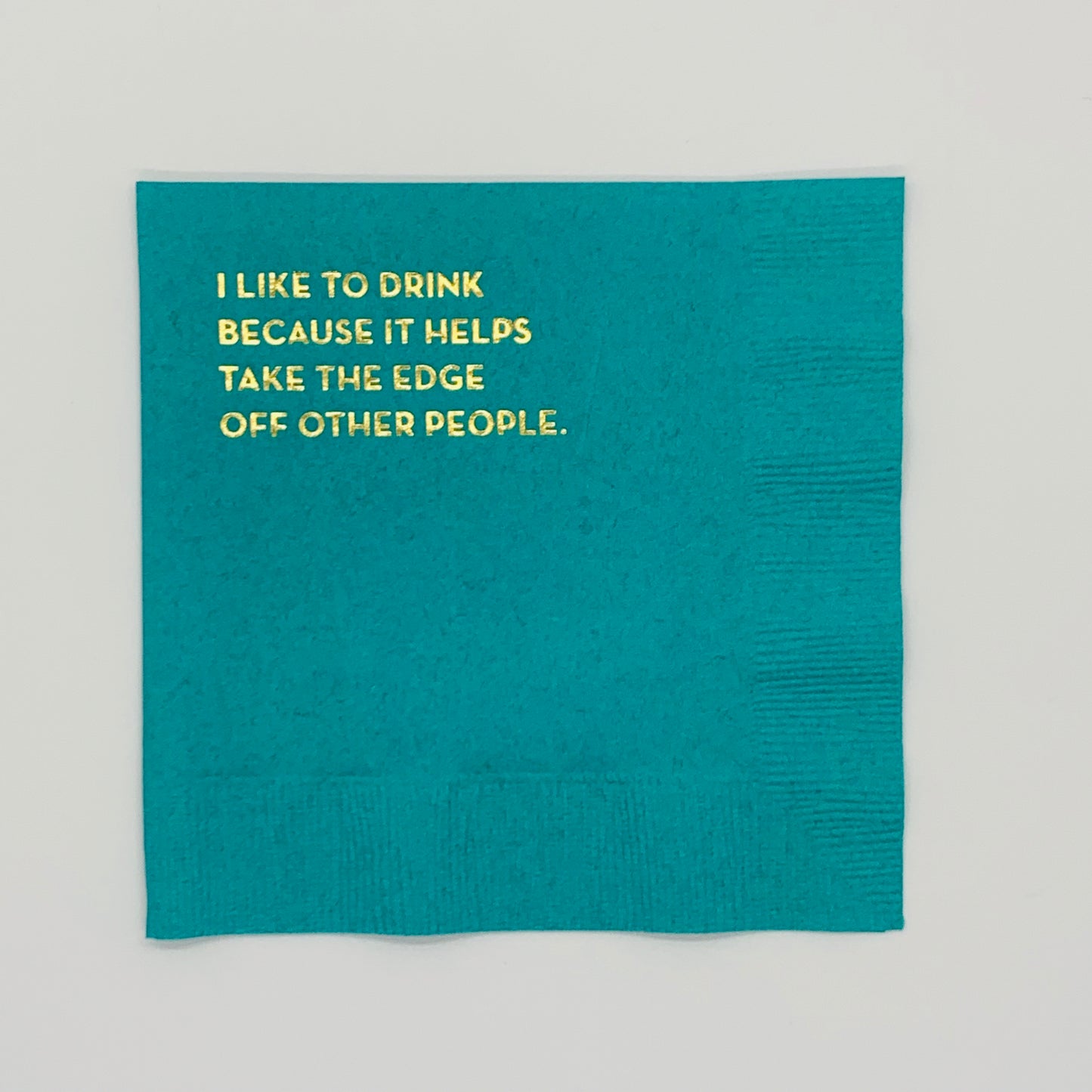 Teal Cocktail Napkin with Gold Font:  I Like to Drink because it helps take the edge off other people.