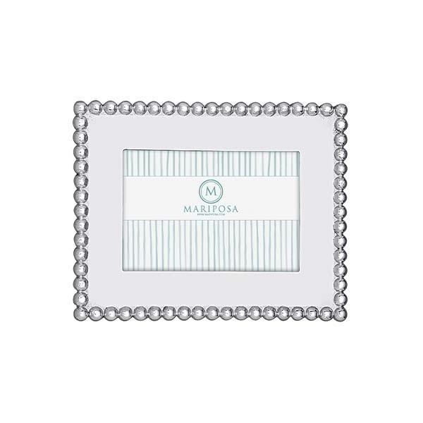 Silver frame with silver connected pearls along the outsdie