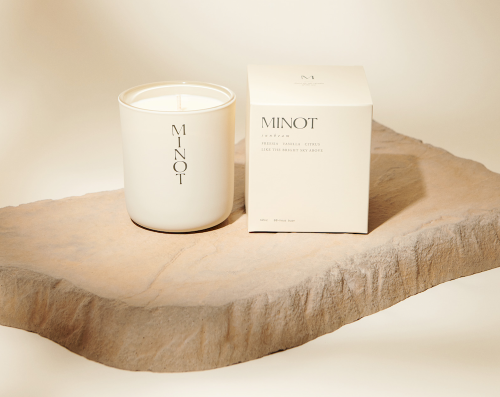 White Minot candle with a white box