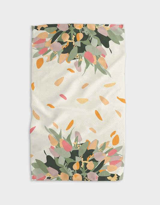 Kitchen towel with pastel color tulip bouquet on top and bottom