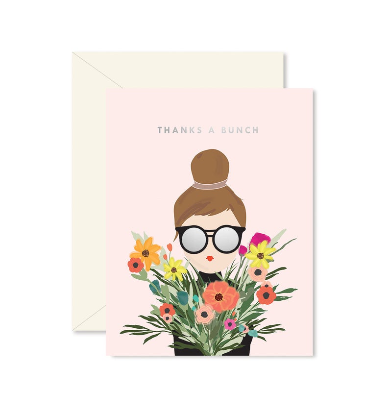 Greeting Card that states Thanks a Bunch. Girl with high bun, sunglasses and a bouquet of flowers