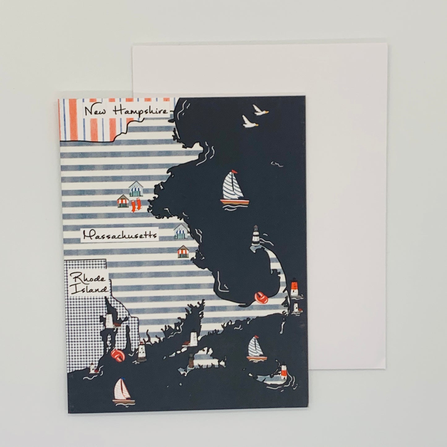 A greeting card depicting a map of New England including New Hampshire, Massachusetts and Rhode Island with coastal scenes and sailboats.