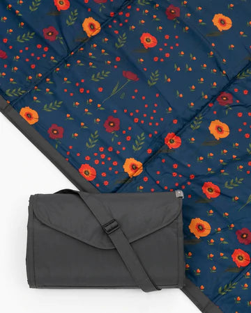 This small, water-resistant blanket is great for both outdoor and indoor play. Its bag-less, compact fold makes packing up quick and easy and an adjustable carrying strap and a pocket makes this on-the-go blanket a true stroller and trunk essential