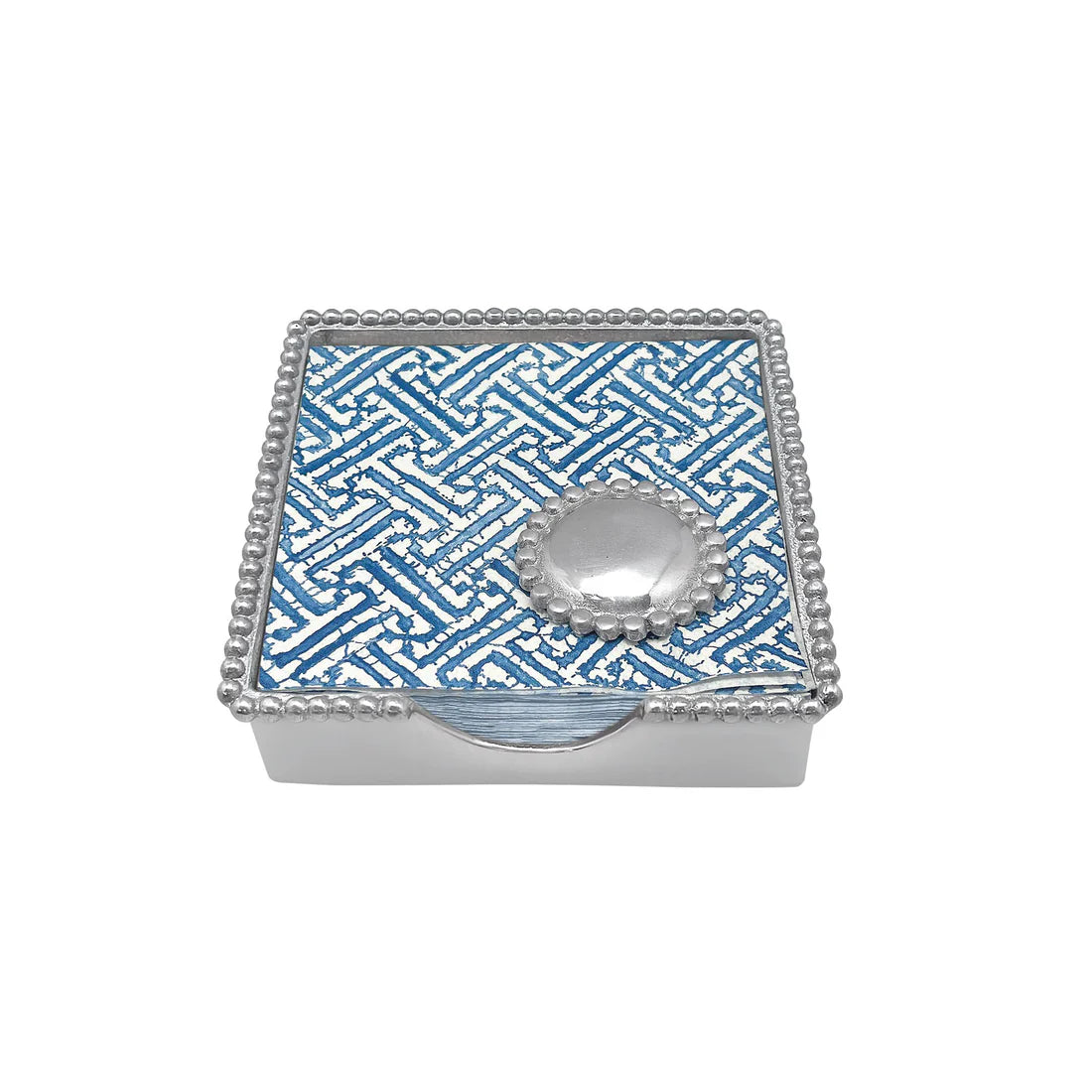 Silver napkin holder with beaded-edged detail. Includes blue and white fretwork cocktail napkins and a silver pearl napkin weight to secure them.