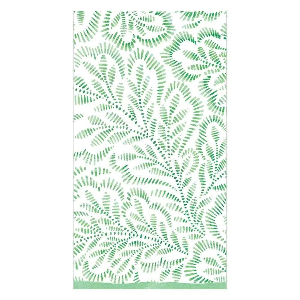White guest towel with green print that resembles a fern