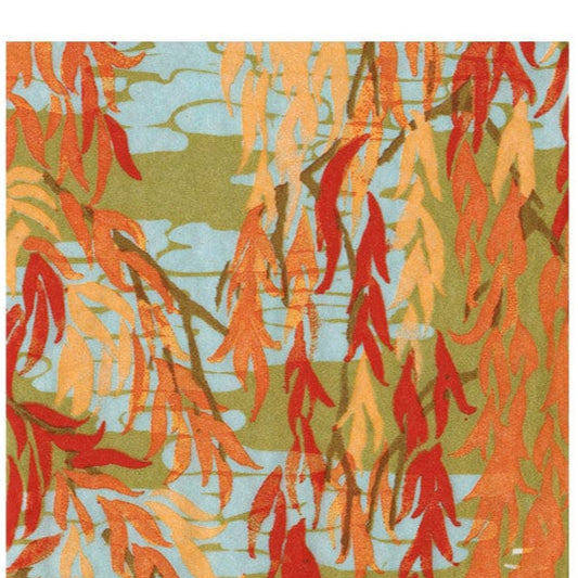 Patterned fabric with red, orange, and green leaves on a blue and green background