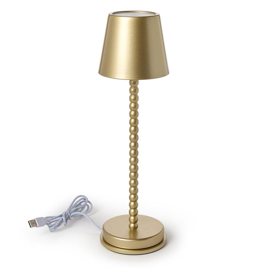 Gold table lamp (beaded stem)with USB cable on a white background