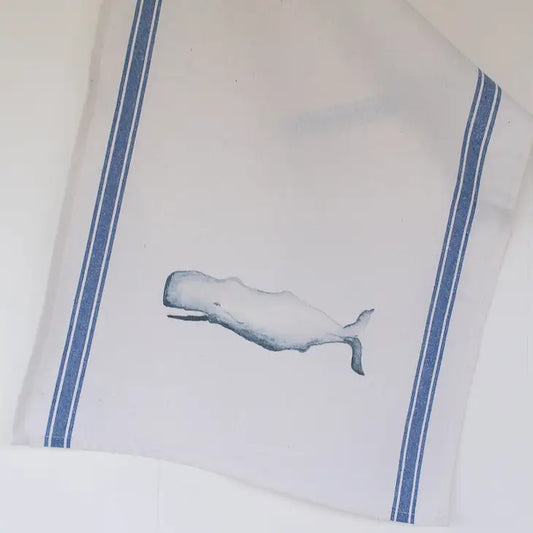 Whale tea towel.  towel has blue vertical stripes on either side