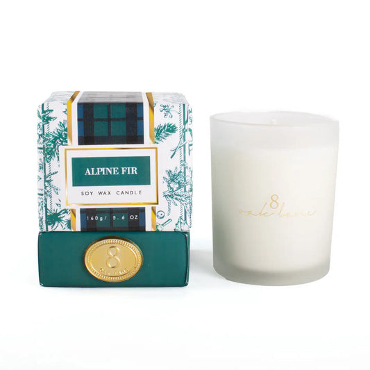 Alpine Fir candle with images of pine and plaid packaging on a white background