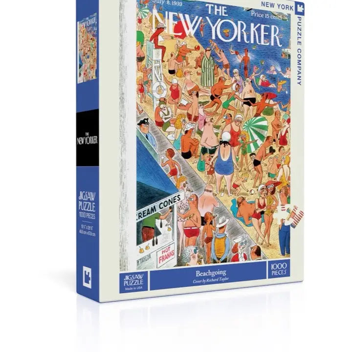 Jigsaw puzzle box featuring a scene with people on a beach
