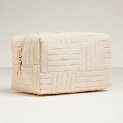 Beige Terry Cloth Travel Bag.  Line/Block pattern 