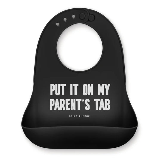 Bella Tunno black food grade silicone bib with "Put it on my parent's tab" printed in white lettering 