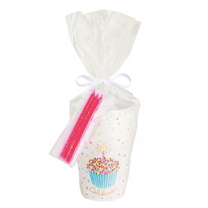 set of six plastic white frosted party cups with colorful birthday cupcake and sprinkles in a clear cello bag tied with three hot pink birthday candles and ribbon