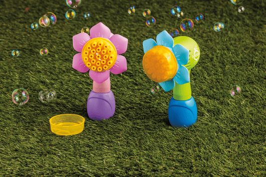 Flower shaped bubble makers in pink or blue with yellow center