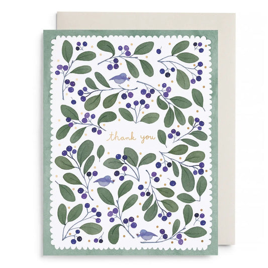 Greeting card with floral design of leaves, berries, and birds, and 'thank you' text on a white background