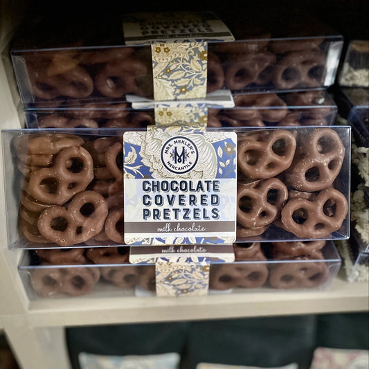 Packaged milk chocolate-covered pretzels with Mrs. Mekler's Mercantile label.