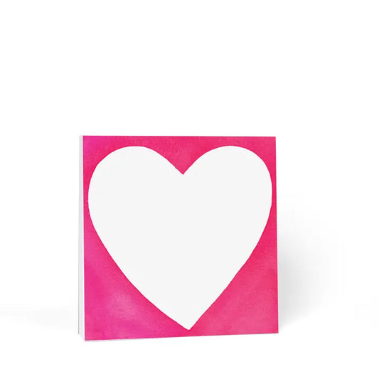 Square Magenta note pad with chubby white heart in the middle.
