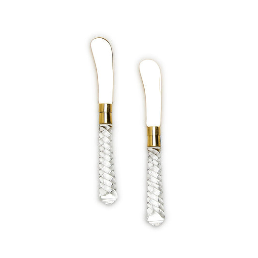 Gold and silver Spreaders that have a clear bottom that swirls