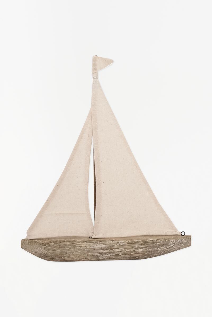 driftwood sailboat with beige canvas sails 