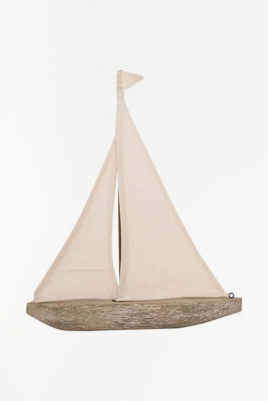 driftwood sailboat with beige canvas sails 