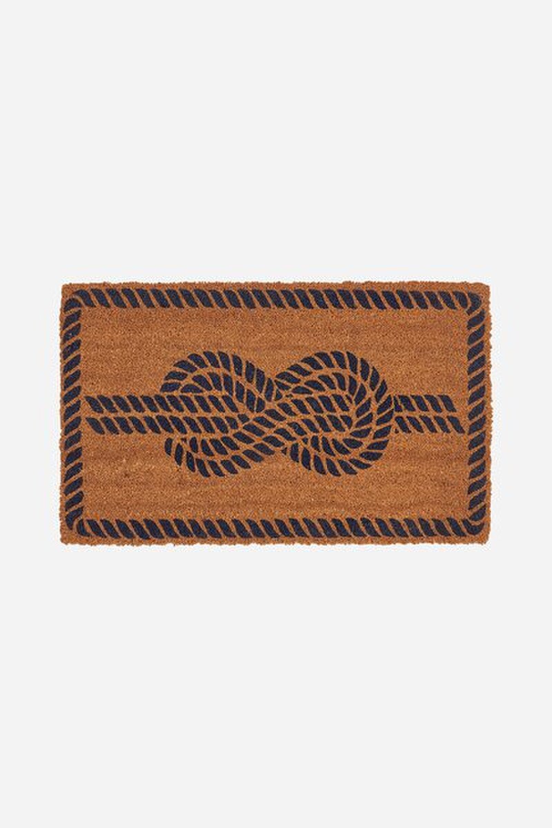 Natural coir doormat with a navy blue nautical rope design