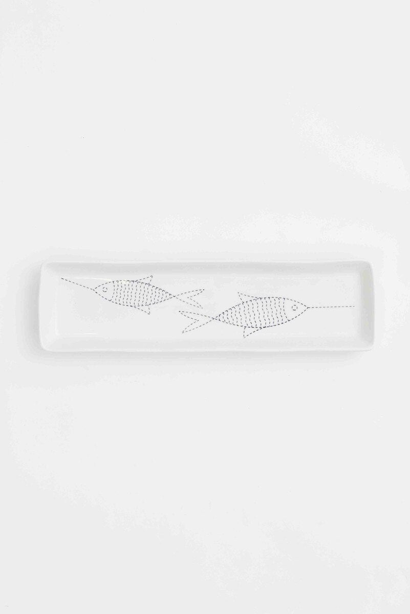 White rectangular tray with a dotted fish design