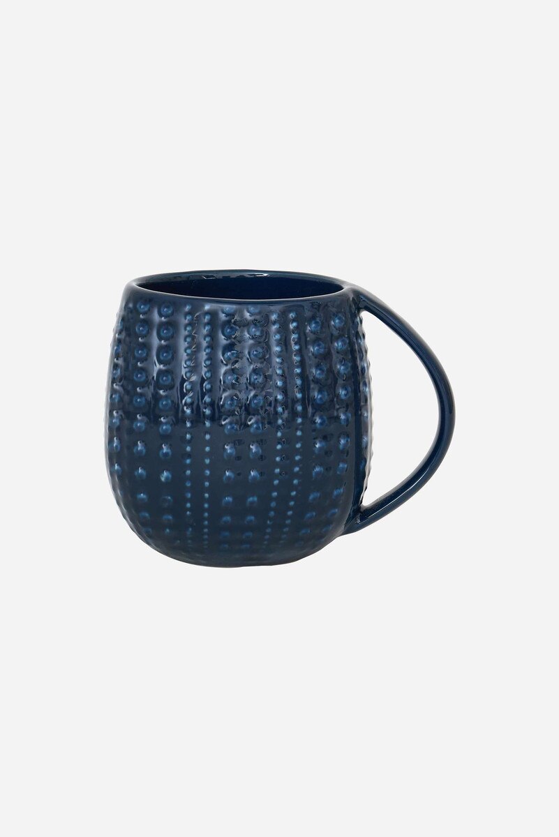 Blue textured ceramic mug designed to look like a sea urchin