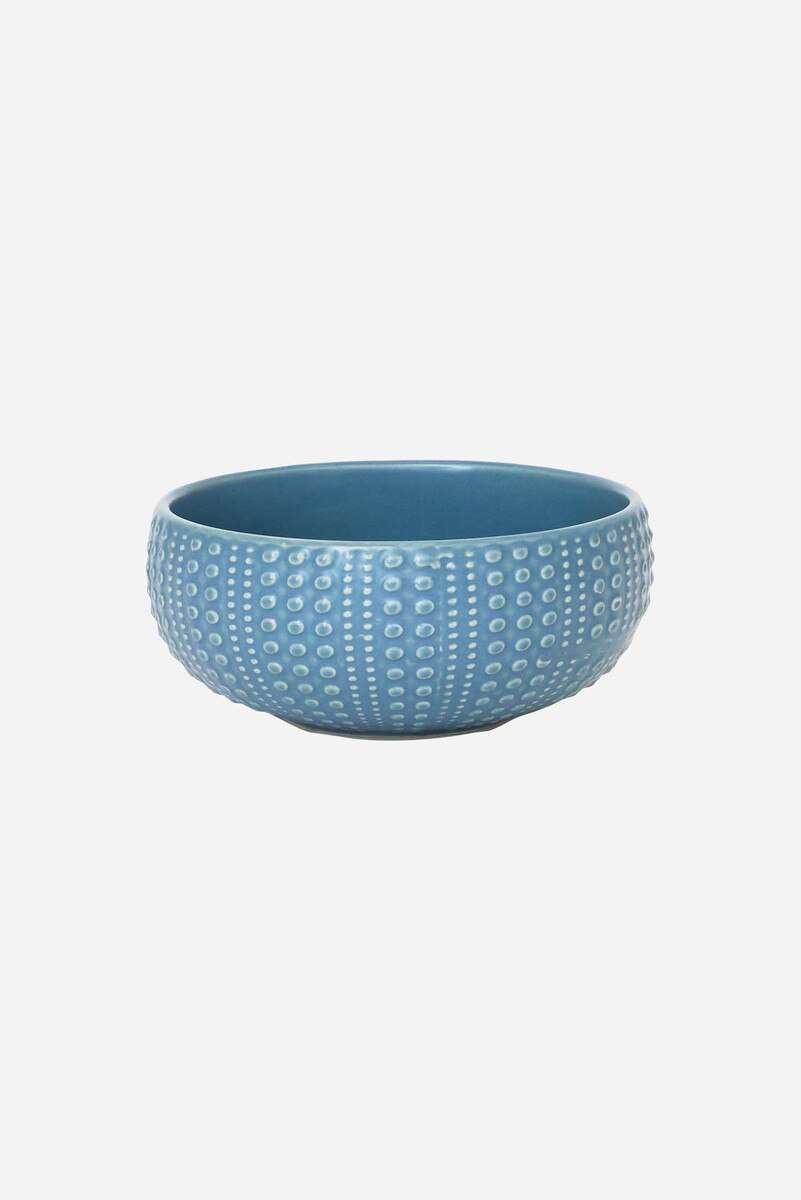 Blue ceramic bowl with textured surface that looks like a sea urchin