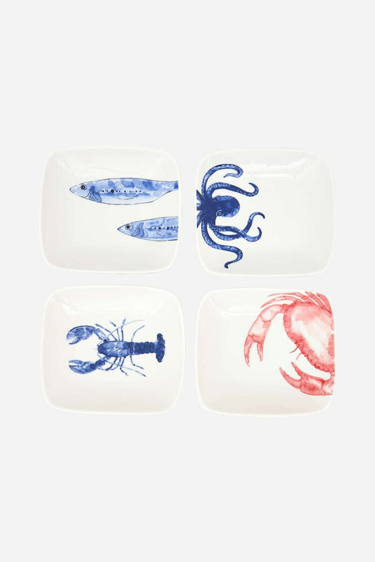 Set of four small white plates with marine life illustrations, including fish, octopus, lobster and crab