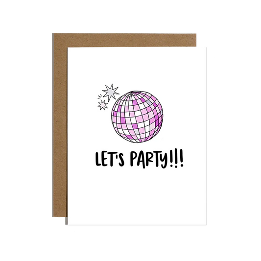 White card with black writing on it and a purple disco ball with silver toutches 