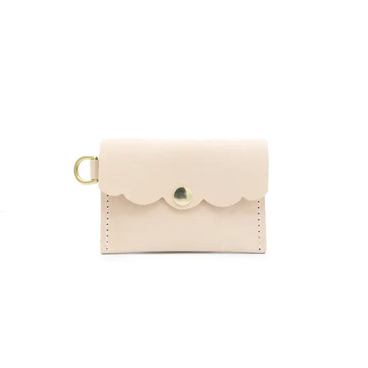 Natural leather mini wallet with scalloped flap, snap closure and side brass loop